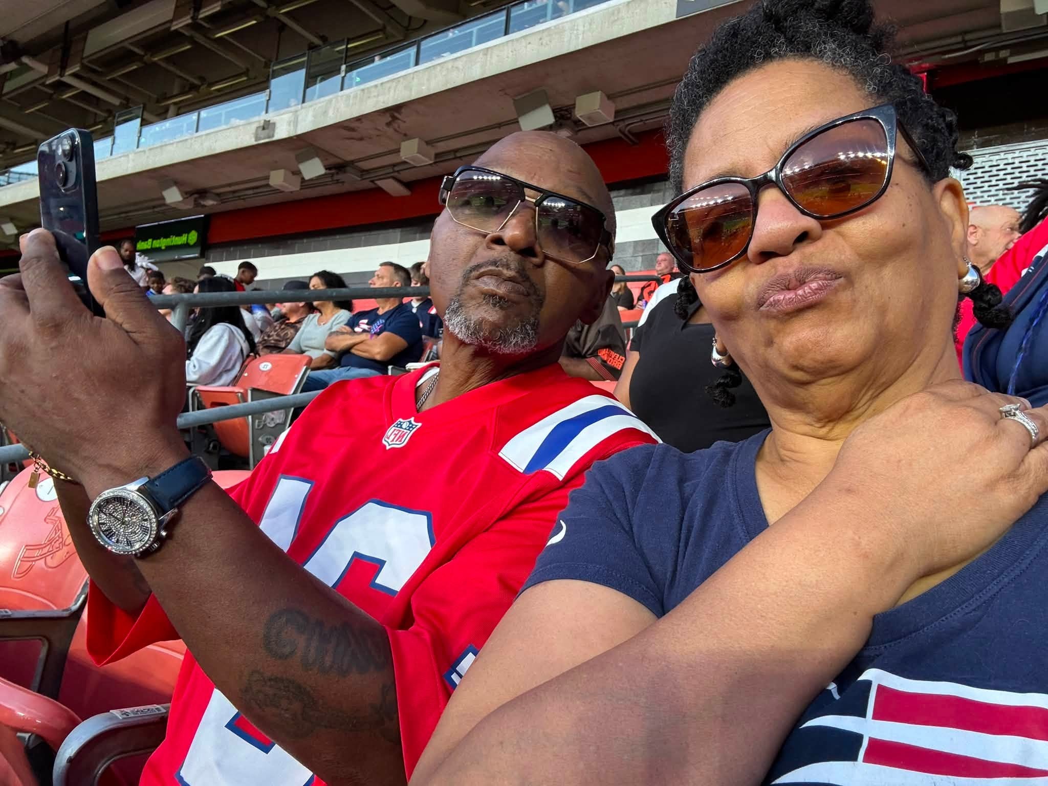 James and Shawn enjoying a football game together